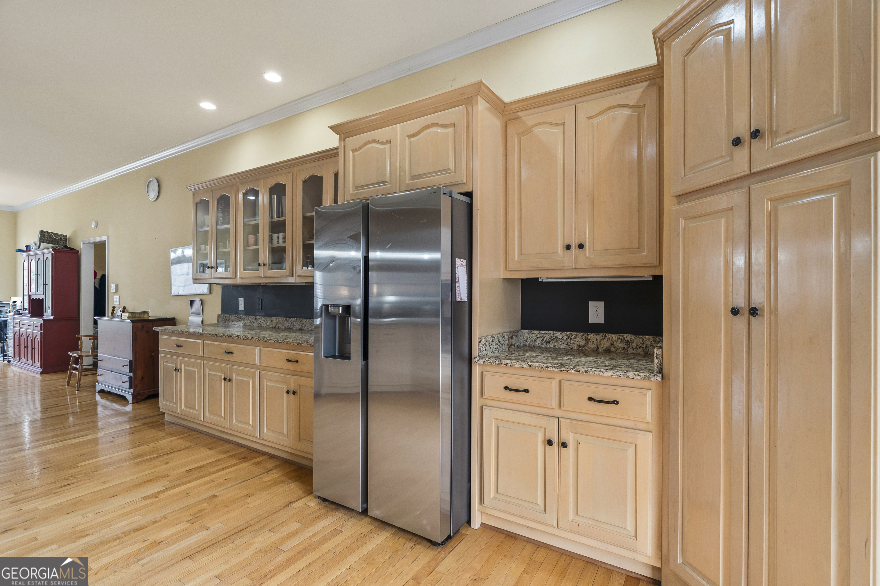 568 Hunt Road Carnesville, GA 30521 - Photo 28 of 106 a kitchen with stainless steel appliances granite countertop a refrigerator and a stove top oven
