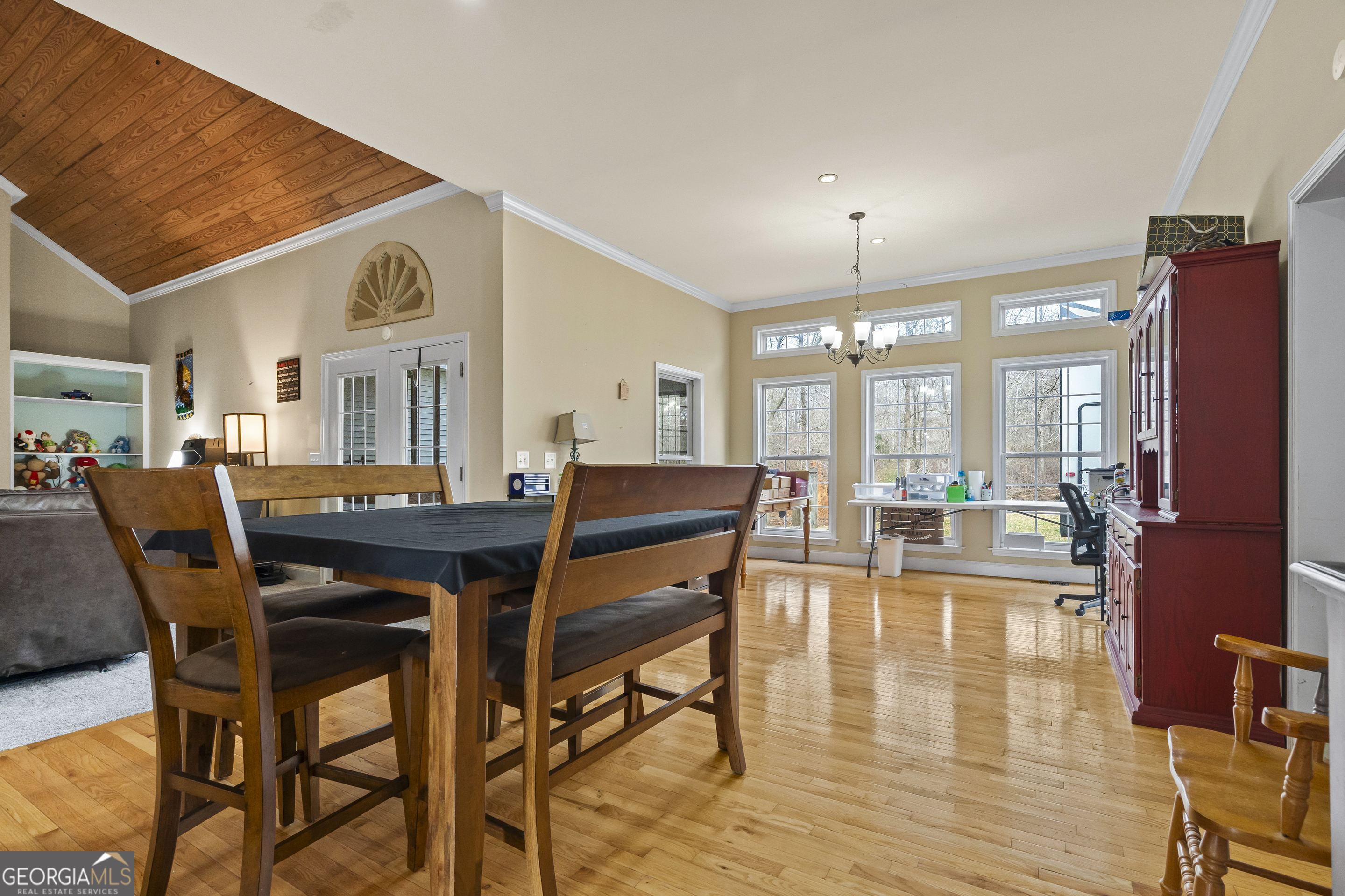 568 Hunt Road Carnesville, GA 30521 - Photo 29 of 106 a view of a dining room with furniture window and wooden floor