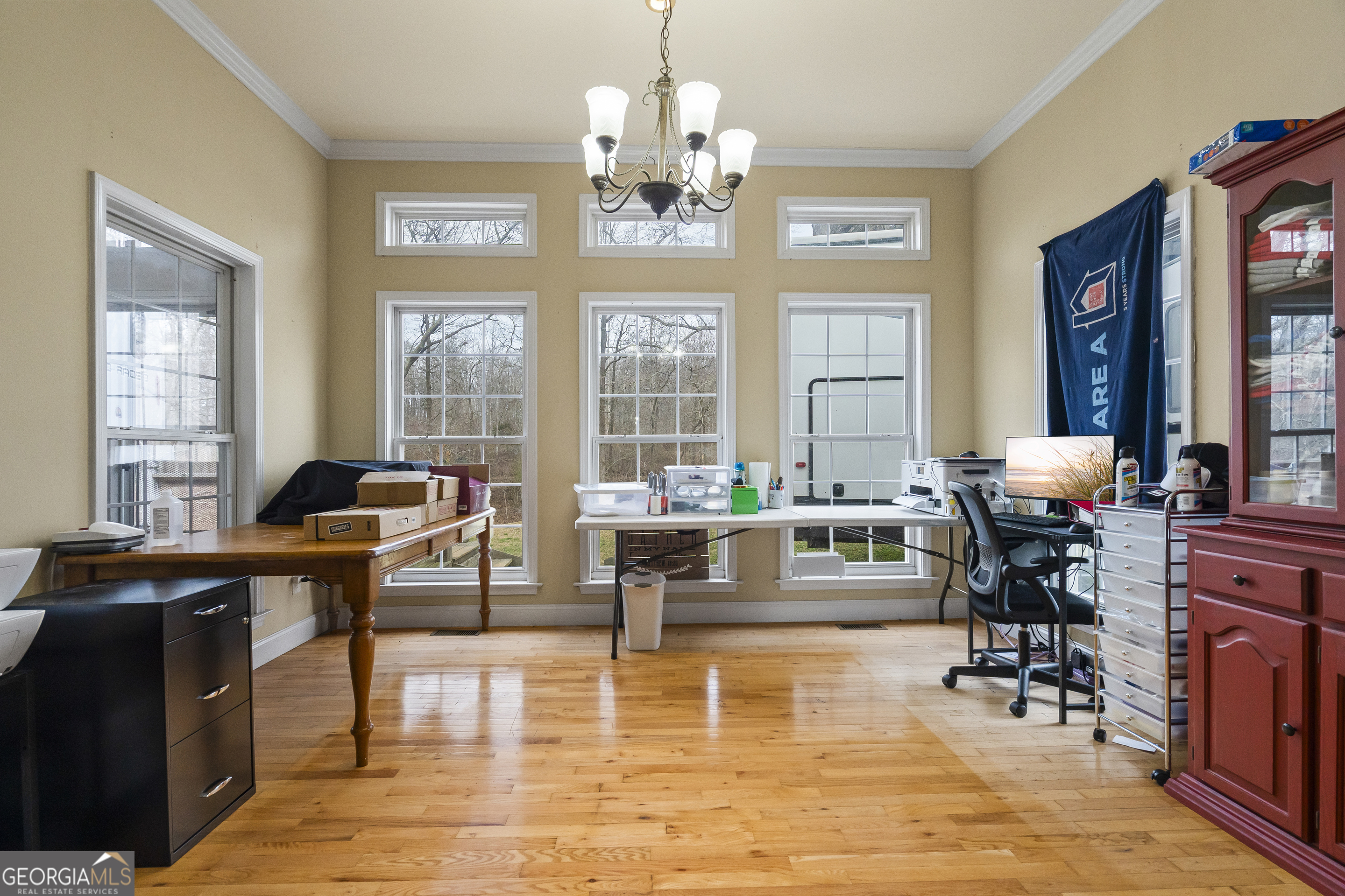568 Hunt Road Carnesville, GA 30521 - Photo 31 of 106 a living room with fireplace furniture and a large window