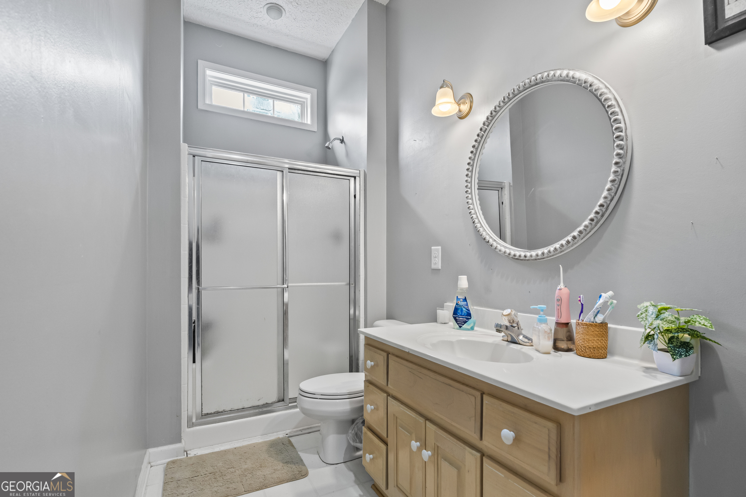 568 Hunt Road Carnesville, GA 30521 - Photo 47 of 106 a bathroom with a sink vanity mirror and toilet