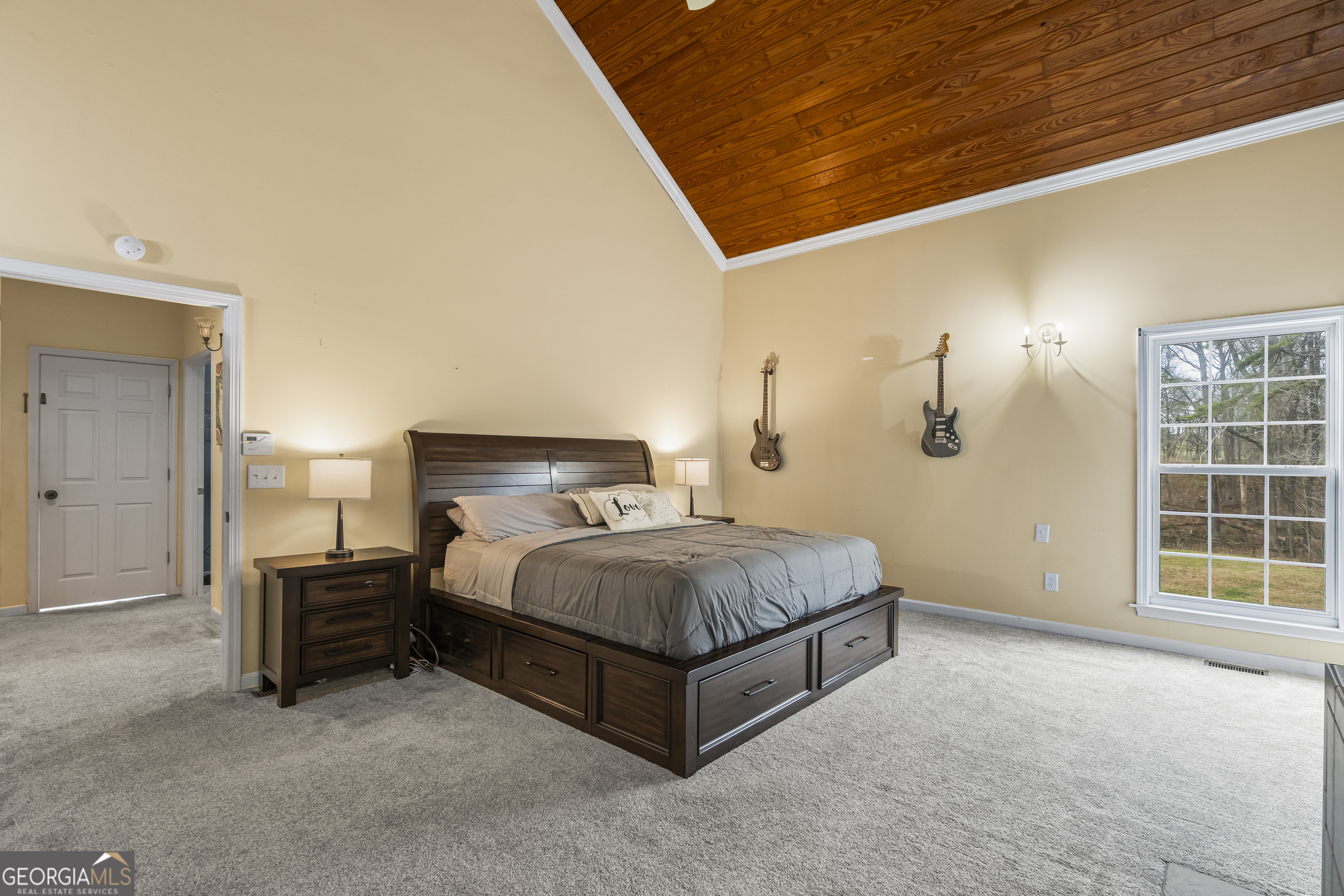 568 Hunt Road Carnesville, GA 30521 - Photo 49 of 106 a spacious bedroom with a bed and a cabinets