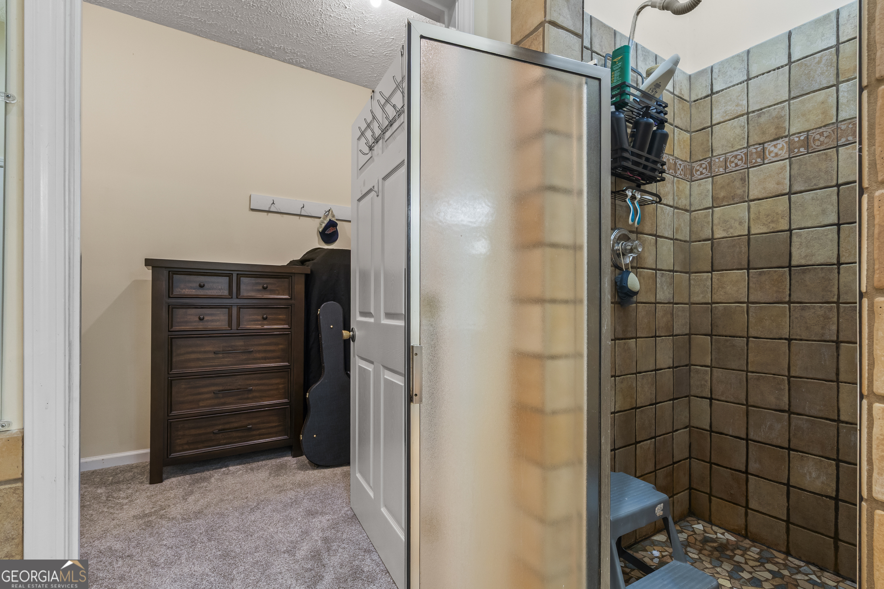 568 Hunt Road Carnesville, GA 30521 - Photo 58 of 106 a bathroom with a shower and a sink