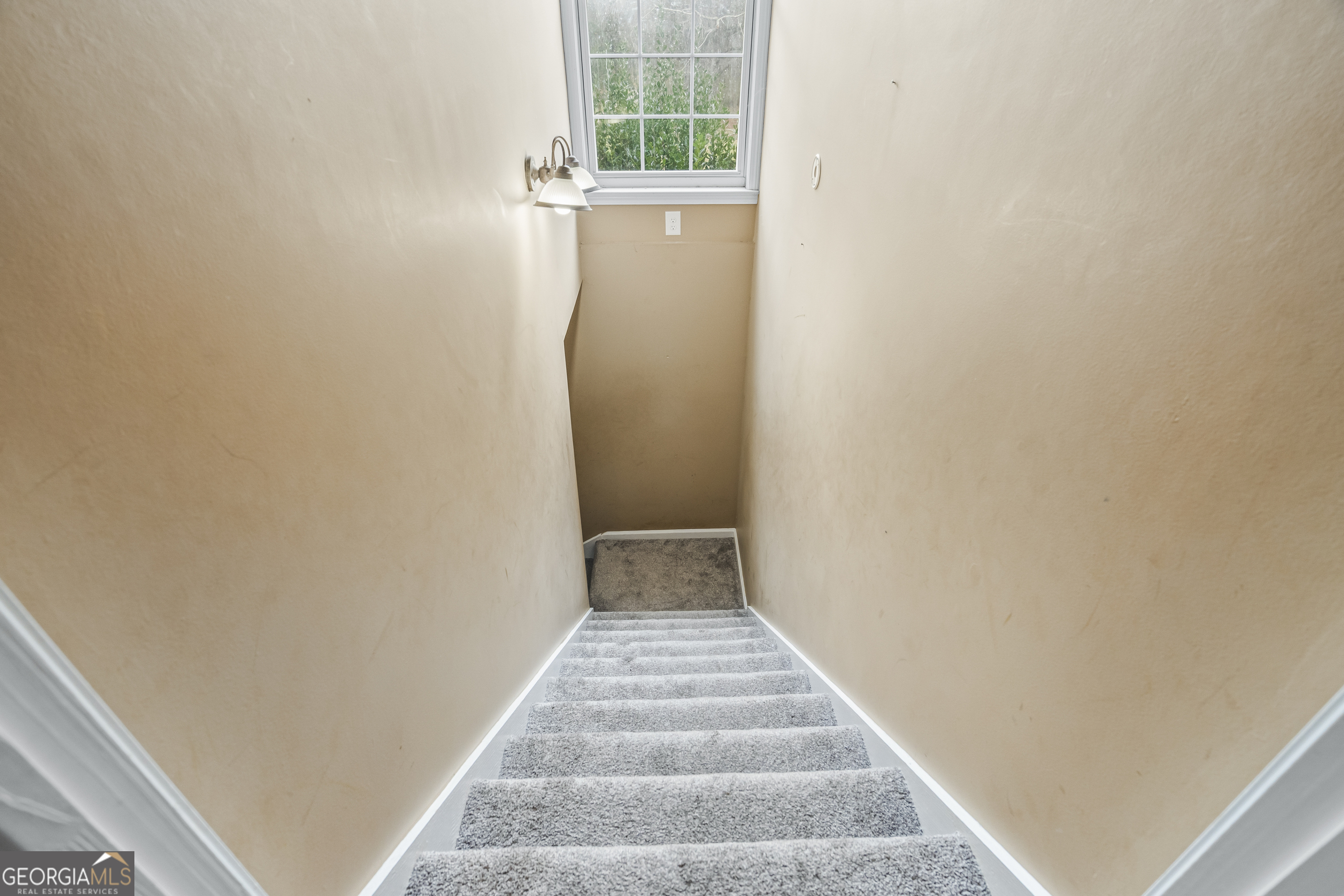 568 Hunt Road Carnesville, GA 30521 - Photo 64 of 106 a view of a hallway with wooden floor and a window