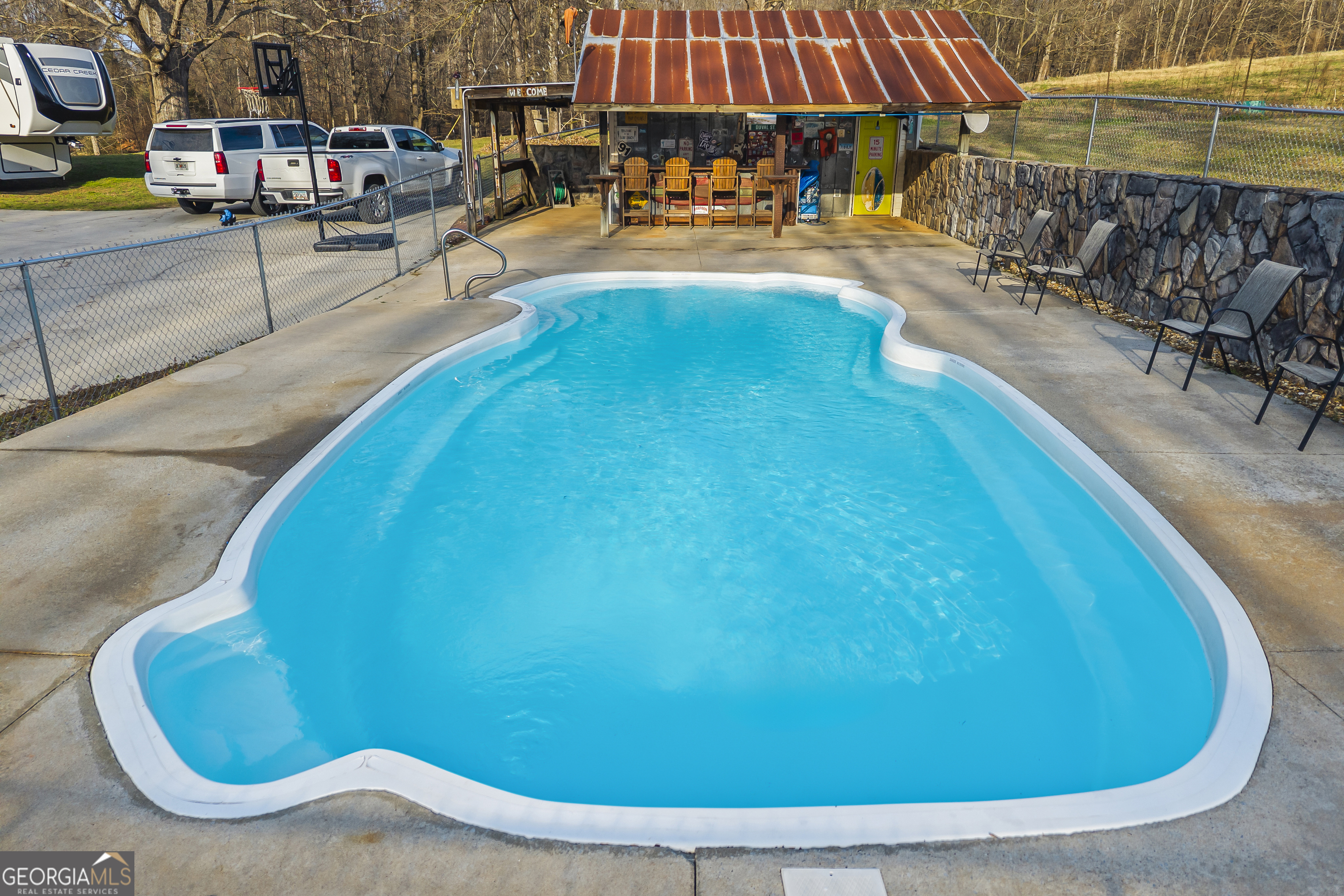 568 Hunt Road Carnesville, GA 30521 - Photo 92 of 106 an outdoor view of a swimming pool