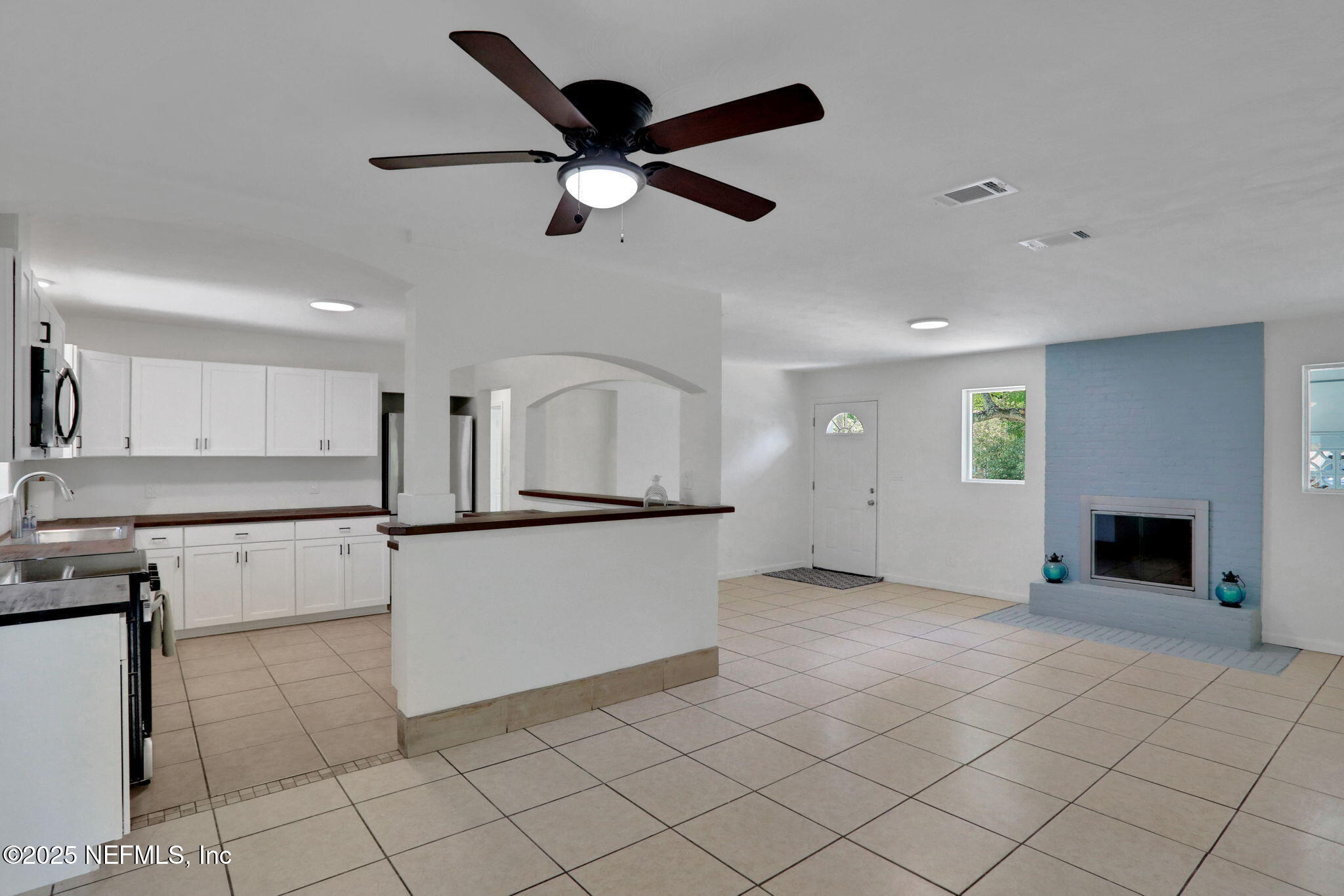 3849 Rogero Road Jacksonville, FL 32277 - Photo 11 of 47 a view of a kitchen with electric appliances