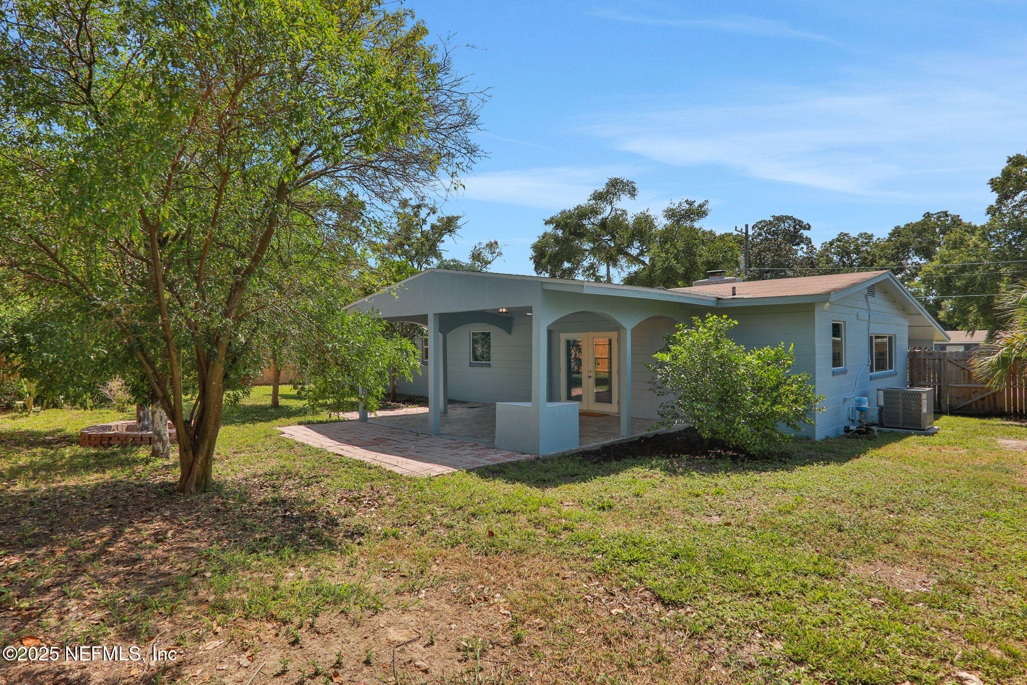 3849 Rogero Road Jacksonville, FL 32277 - Photo 4 of 47 a view of a house with backyard and garden