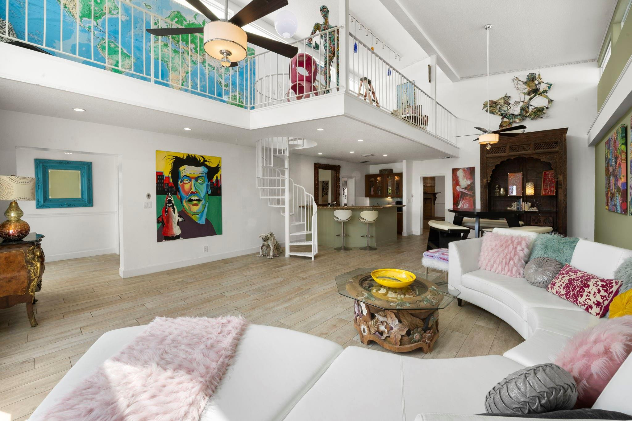 2675 Northeast 24th Street Lighthouse Point, FL 33064 - Photo 38 of 48 a living room with furniture a chandelier and a rug