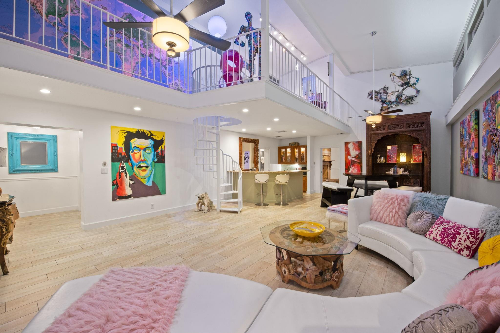 2675 Northeast 24th Street Lighthouse Point, FL 33064 - Photo 40 of 48 a living room with furniture and painting on the wall