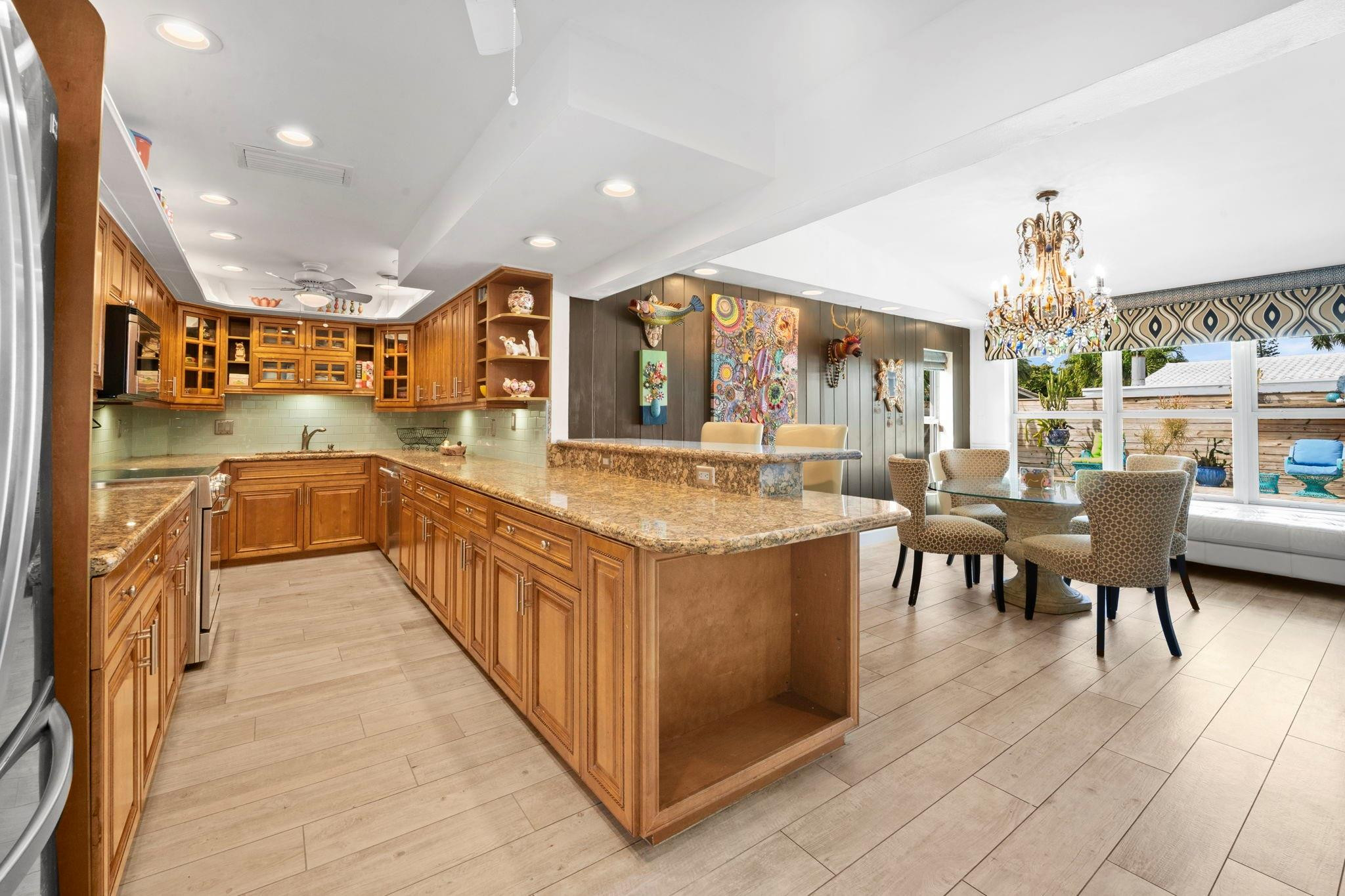 2675 Northeast 24th Street Lighthouse Point, FL 33064 - Photo 41 of 48 a view of a kitchen and dining room