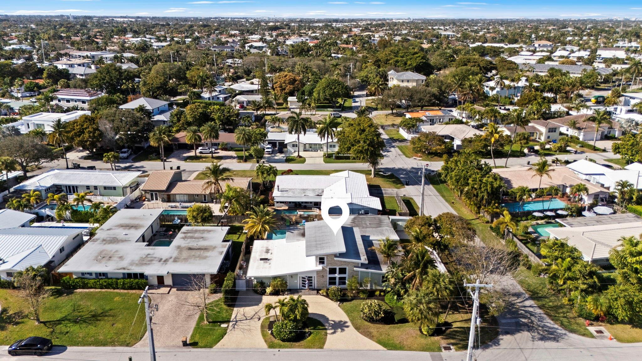 2675 Northeast 24th Street Lighthouse Point, FL 33064 - Photo 44 of 48 an aerial view of residential houses with outdoor space