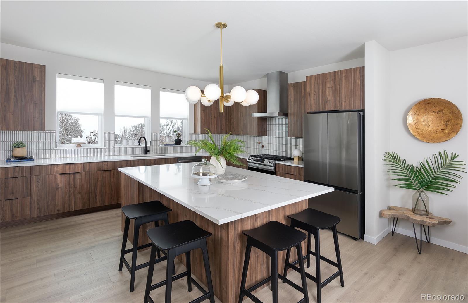 14472 Tranquil Court Morrison, CO 80465 - Photo 7 of 13 a very nice looking dining room with a table and chairs