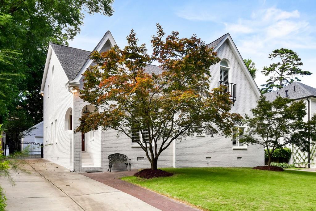 797 Cumberland Road Northeast Atlanta, GA 30306 - Photo 1 of 1 Newly painted white brick exterior