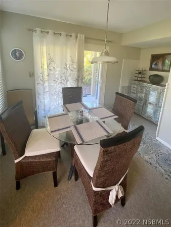 a living room with a couch and a table