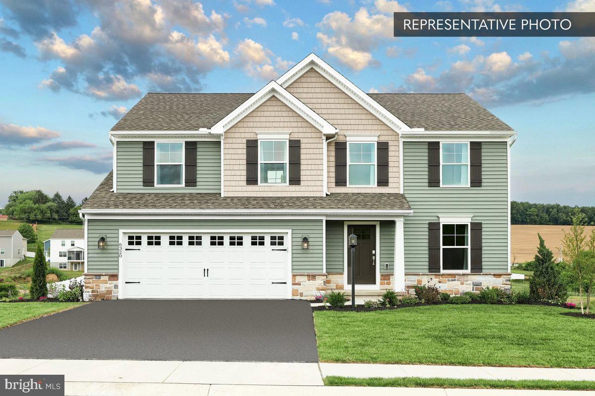 6310 Liam Drive Spring Grove, PA 17362 - Photo 1 of 1 a front view of a house with a yard