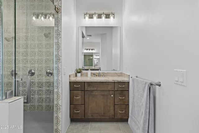 a bathroom with a bathtub and shower