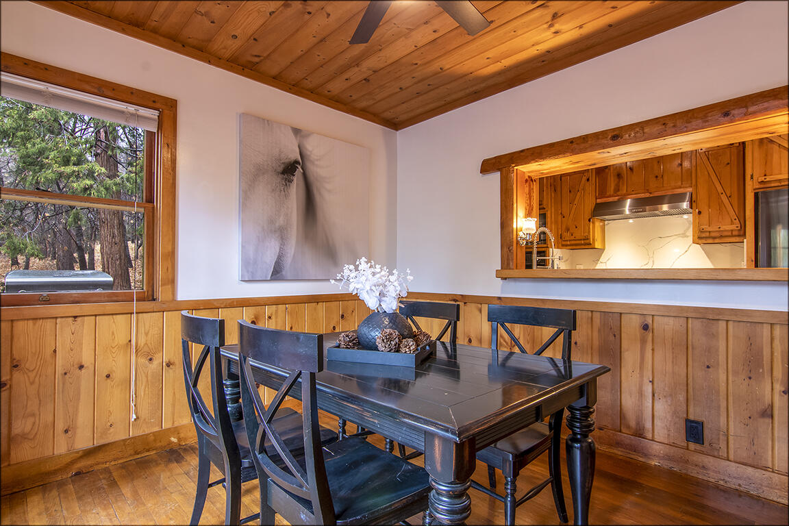 25455 Lodge Road Idyllwild, CA 92549 - Photo 21 of 95 a view of a dining room with furniture and window