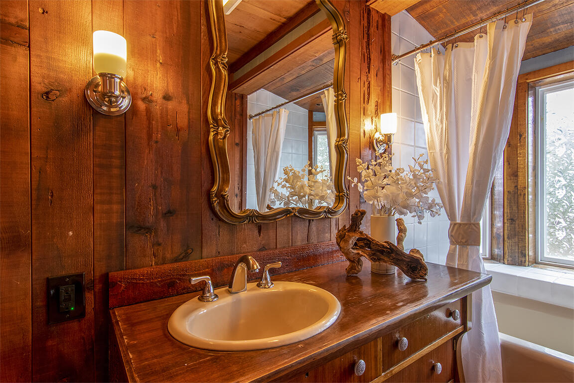 25455 Lodge Road Idyllwild, CA 92549 - Photo 33 of 95 a bathroom with a sink and a mirror