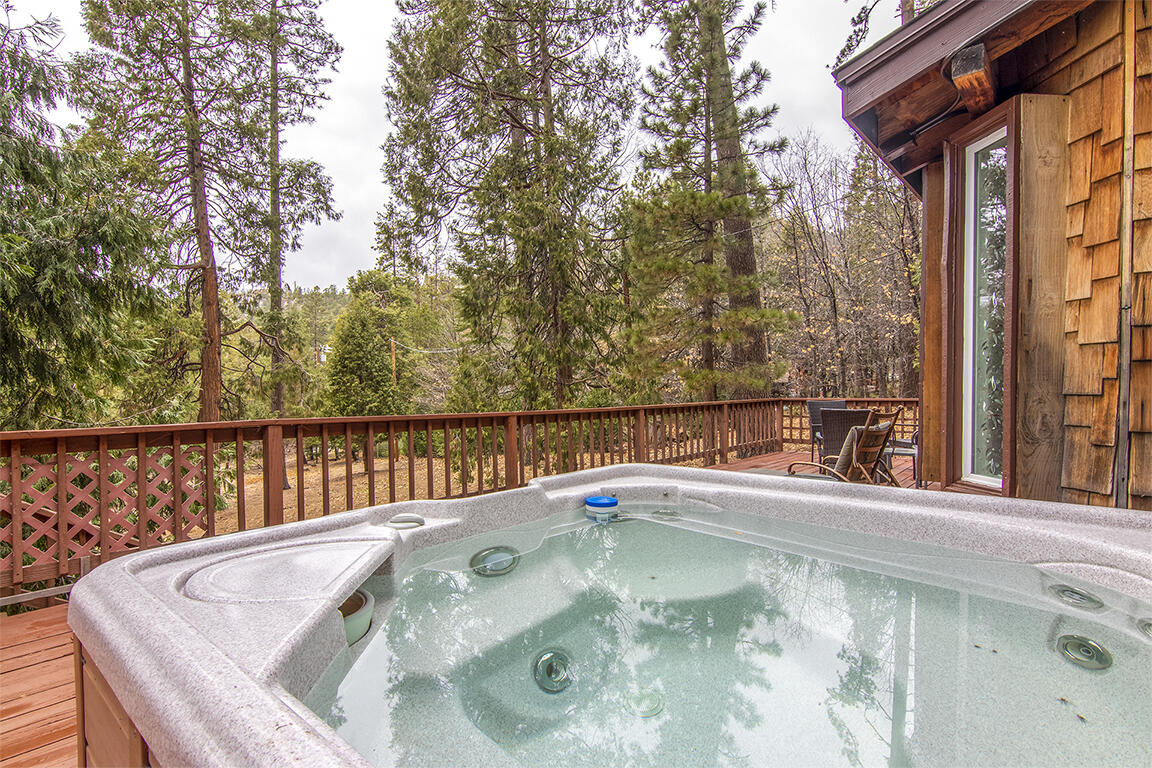 25455 Lodge Road Idyllwild, CA 92549 - Photo 44 of 95 a view of swimming pool with lake and trees in the background