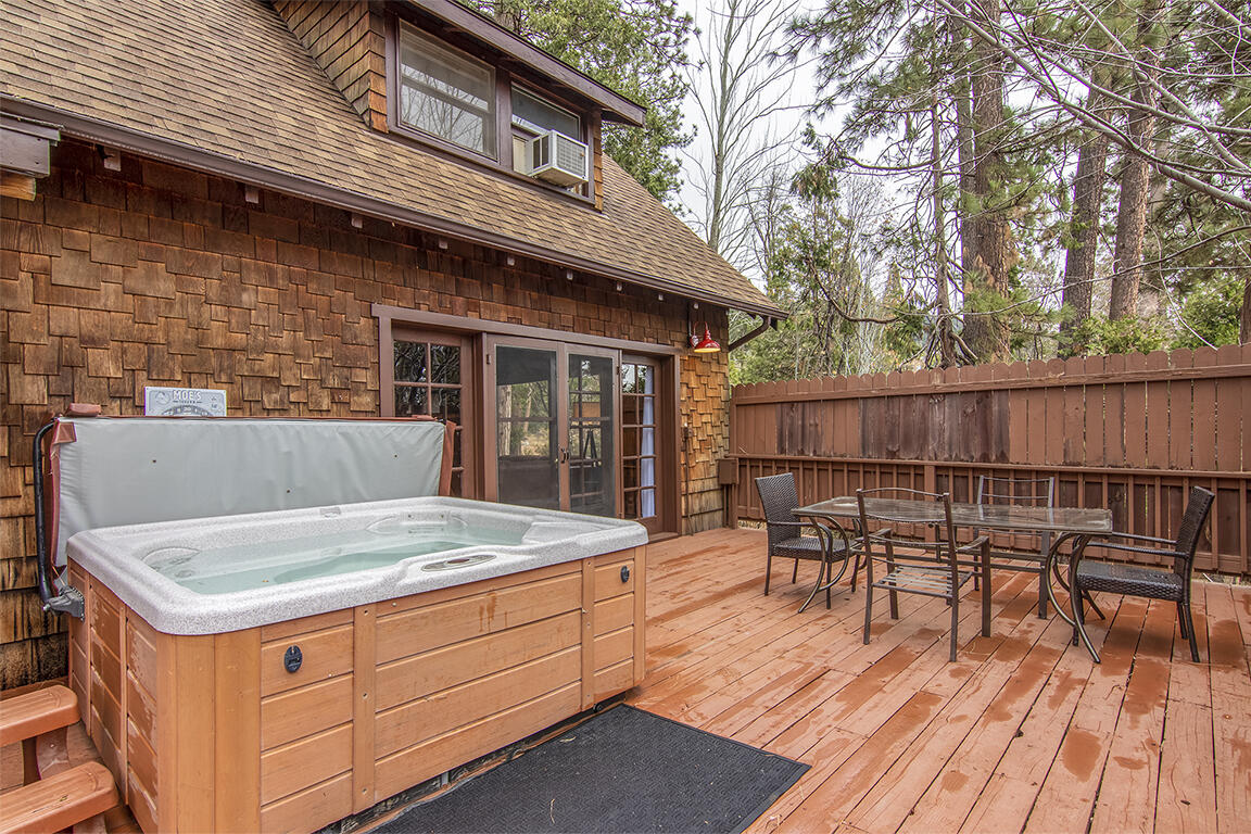 25455 Lodge Road Idyllwild, CA 92549 - Photo 46 of 95 a view of a dinning table and chairs in patio of the house