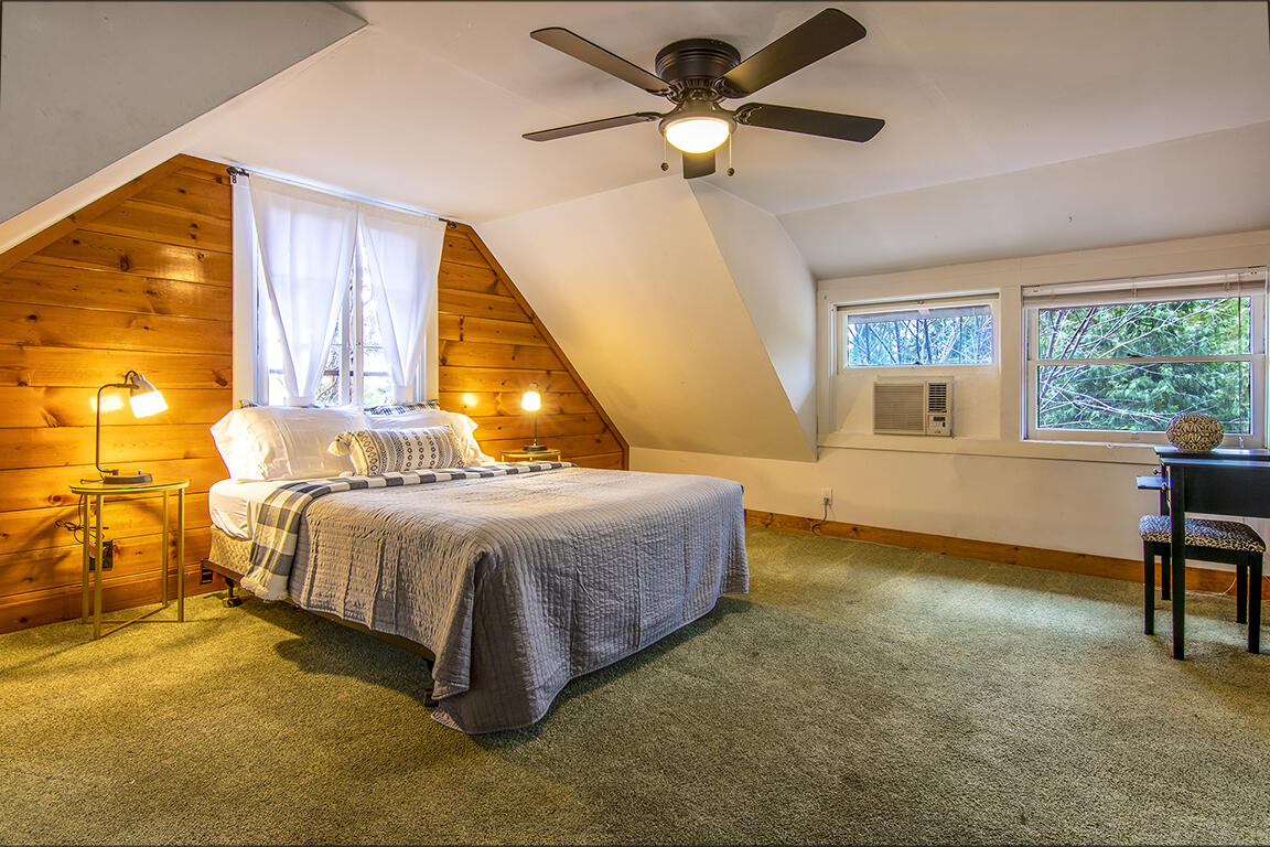 25455 Lodge Road Idyllwild, CA 92549 - Photo 53 of 95 a bedroom with a bed and a table