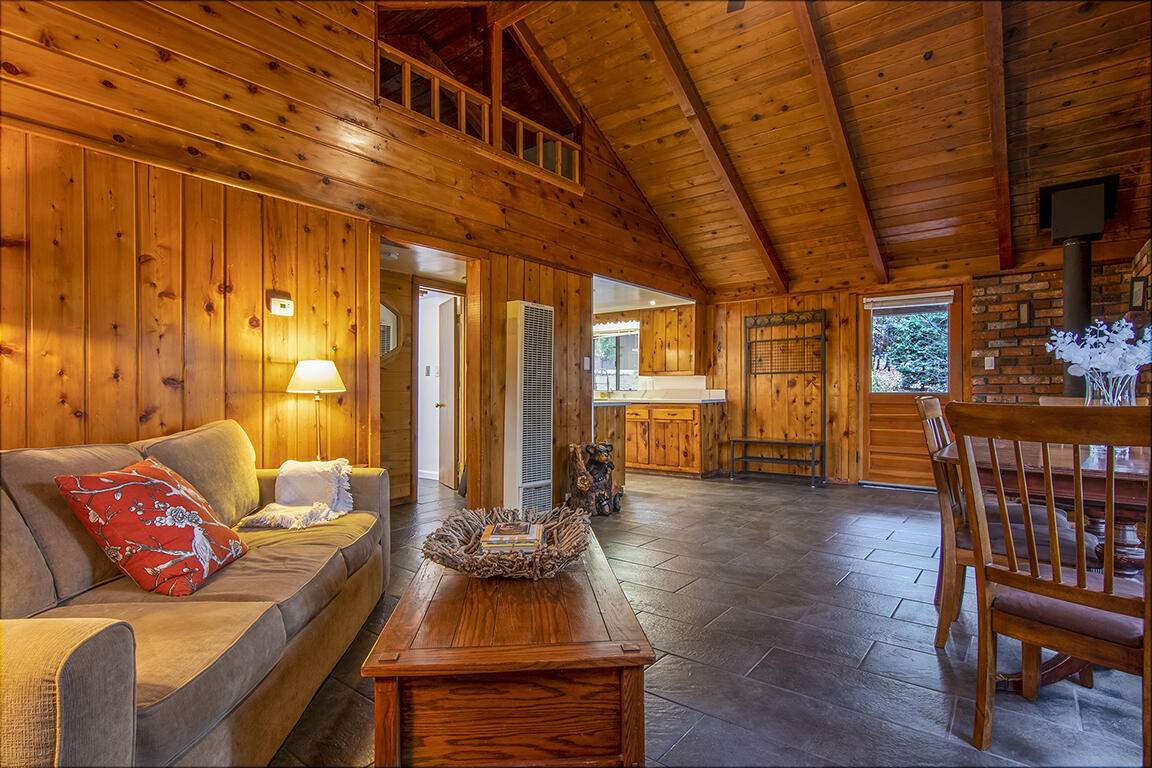 25455 Lodge Road Idyllwild, CA 92549 - Photo 61 of 95 a living room with furniture and wooden floor