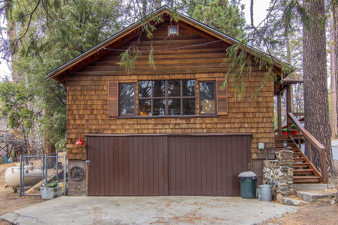 25455 Lodge Road Idyllwild, CA 92549 - Photo 78 of 95 a front view of a house with garage