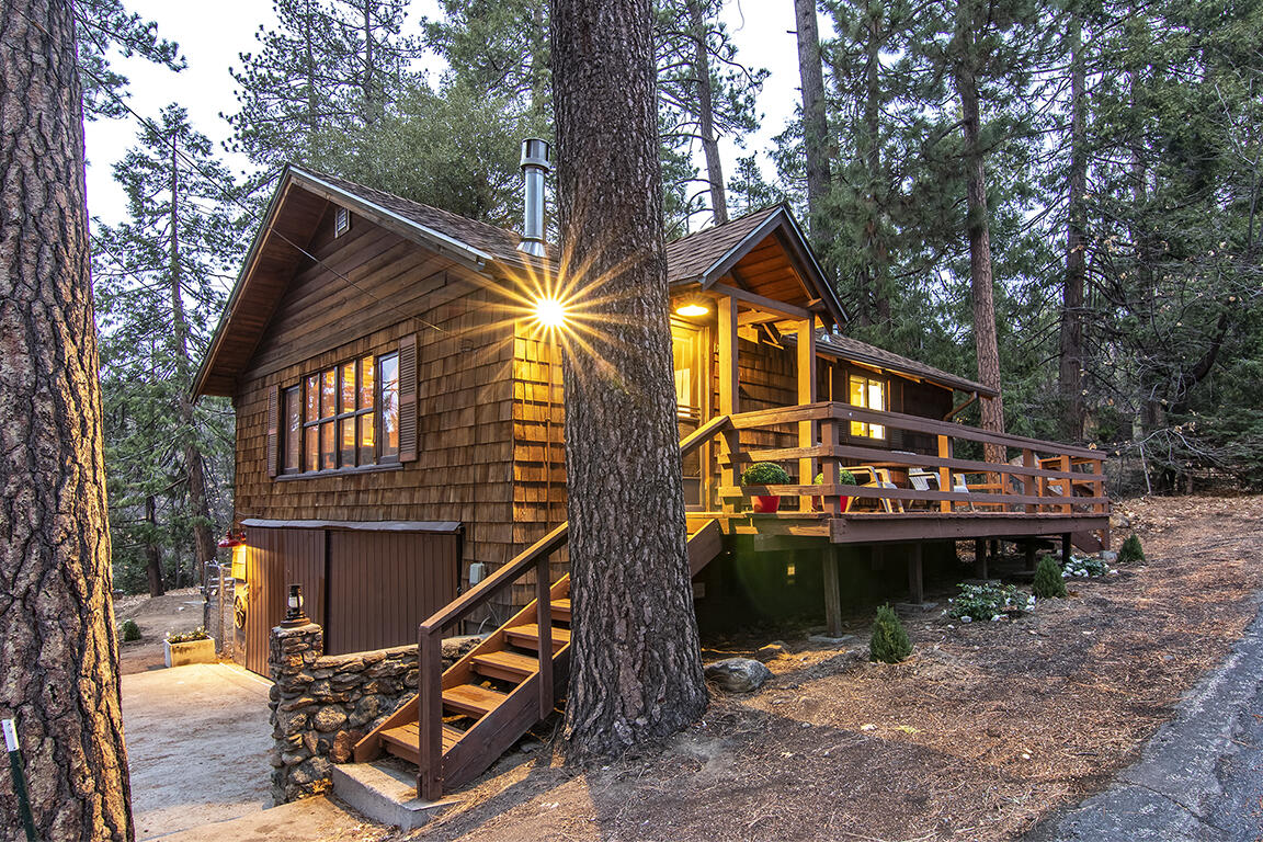 25455 Lodge Road Idyllwild, CA 92549 - Photo 84 of 95 a view of house with wooden deck and a forest
