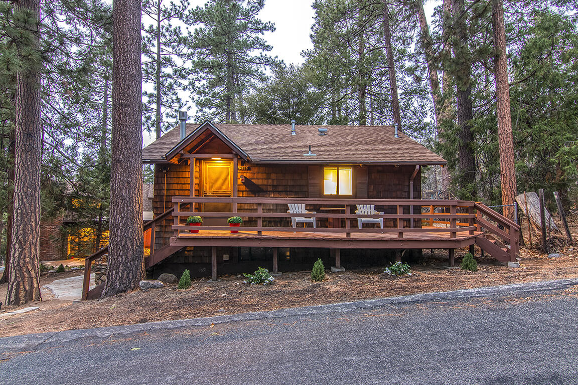 25455 Lodge Road Idyllwild, CA 92549 - Photo 85 of 95 a front view of a house with a garden and trees