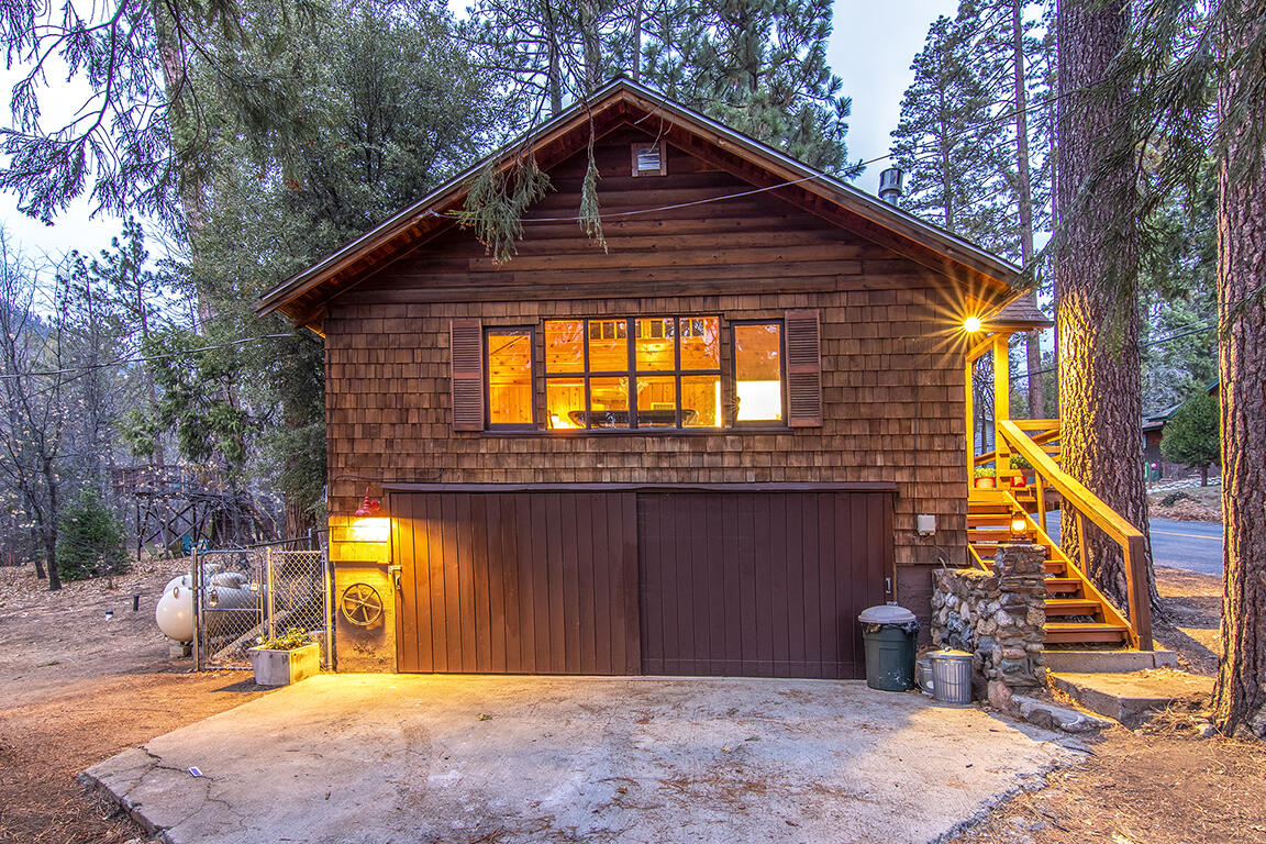 25455 Lodge Road Idyllwild, CA 92549 - Photo 88 of 95 a front view of a house with a yard