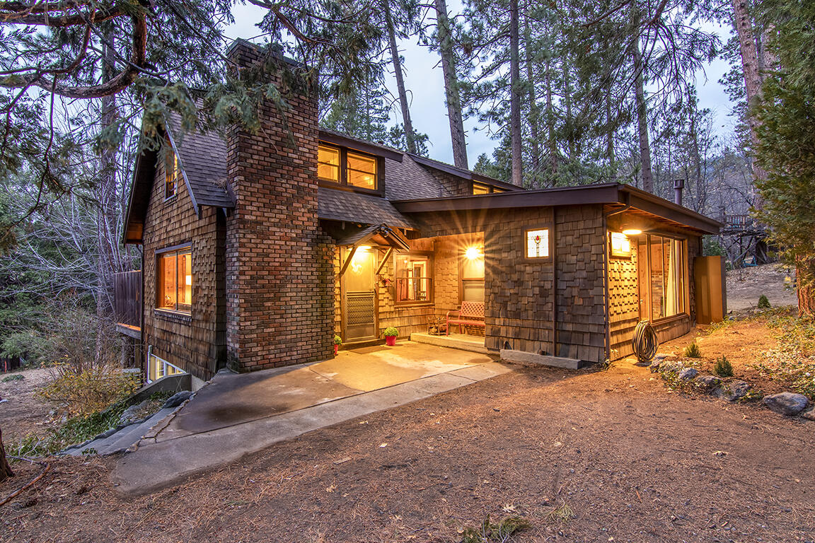 25455 Lodge Road Idyllwild, CA 92549 - Photo 89 of 95 a view of a house with backyard and sitting area