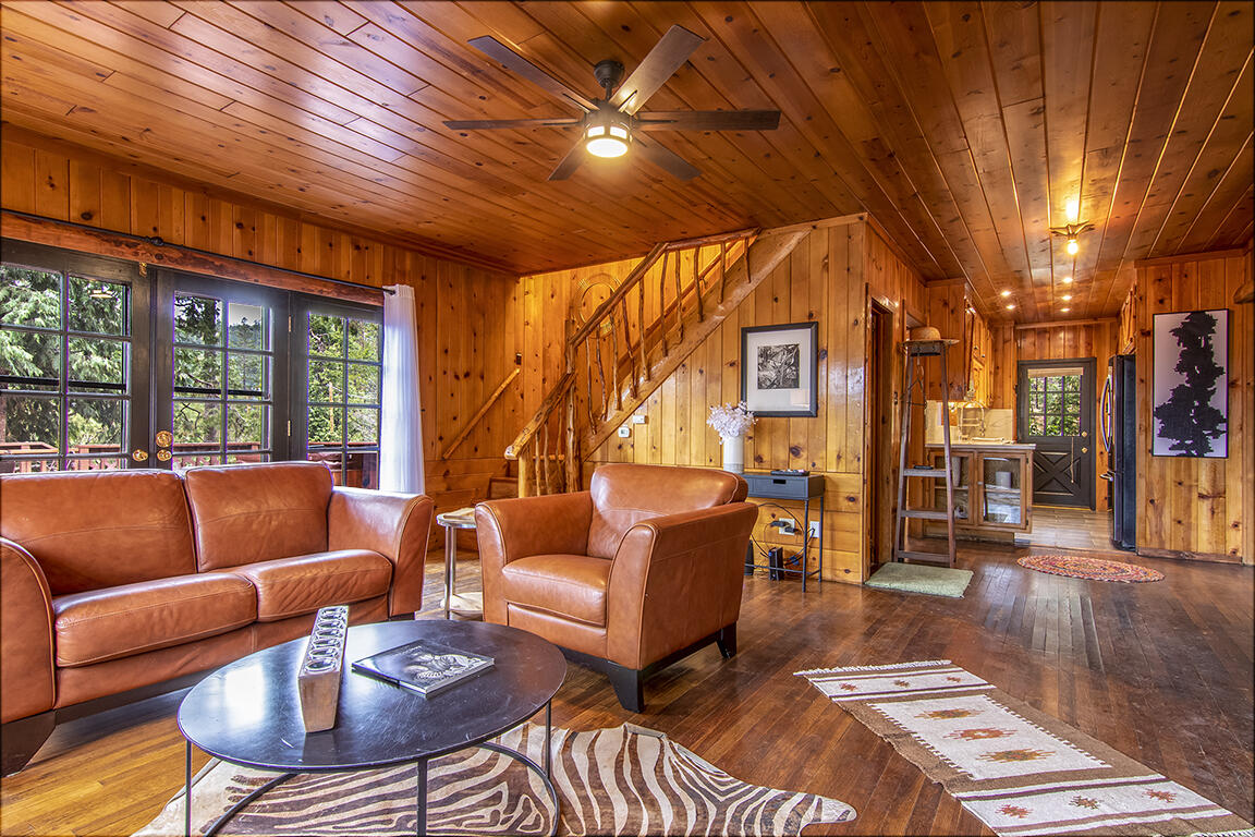 25455 Lodge Road Idyllwild, CA 92549 - Photo 10 of 95 a outdoor living space with patio furniture and wooden floor