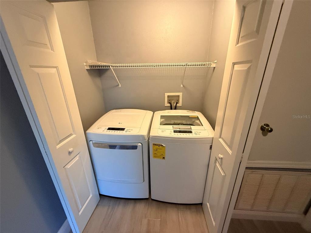 1325 Lyonshire Drive Wesley Chapel, FL 33543 - Photo 11 of 20 a utility room with dryer and washer