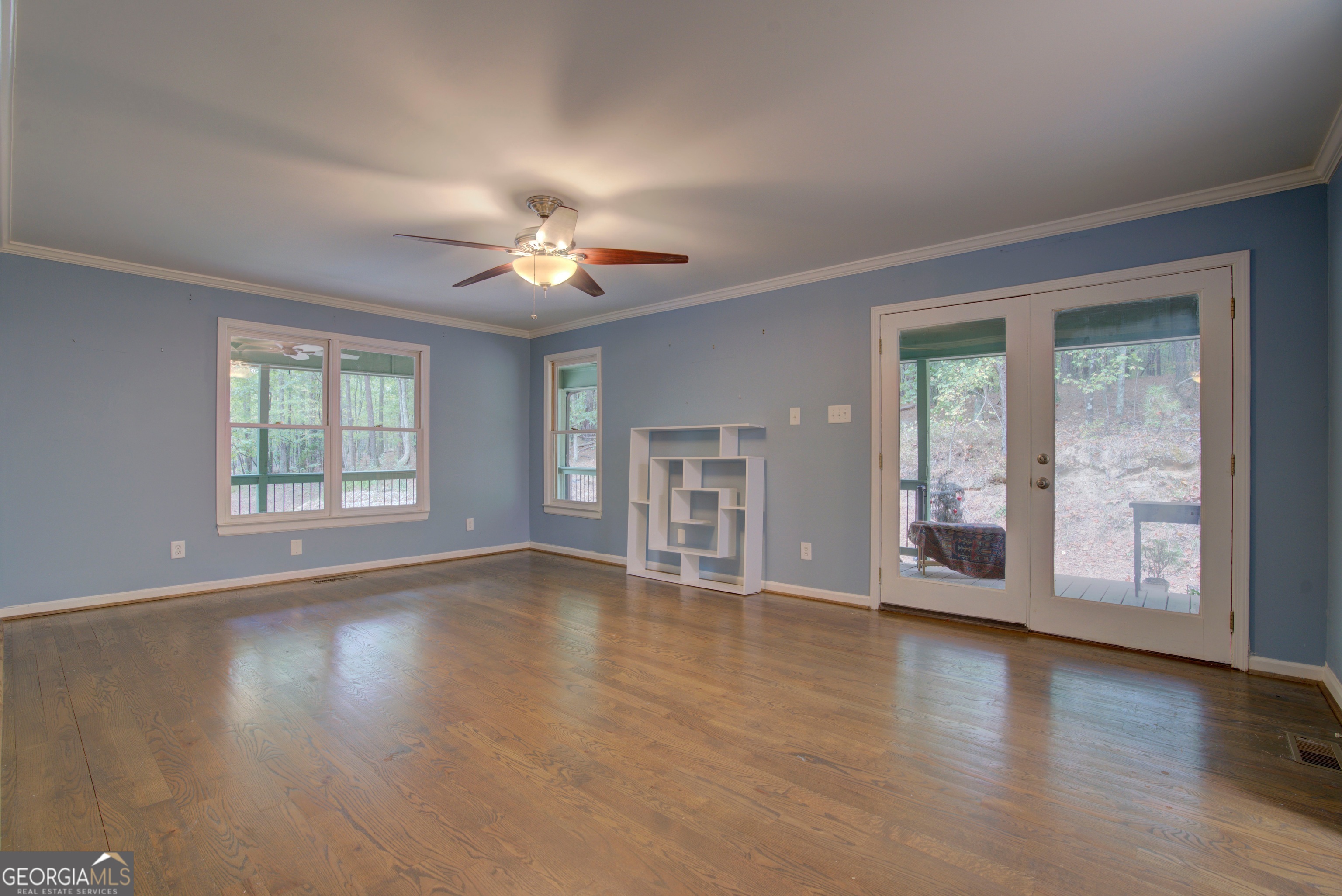637 Wayside Road Rome, GA 30161 - Photo 13 of 40 a view of an empty room with a window and wooden floor