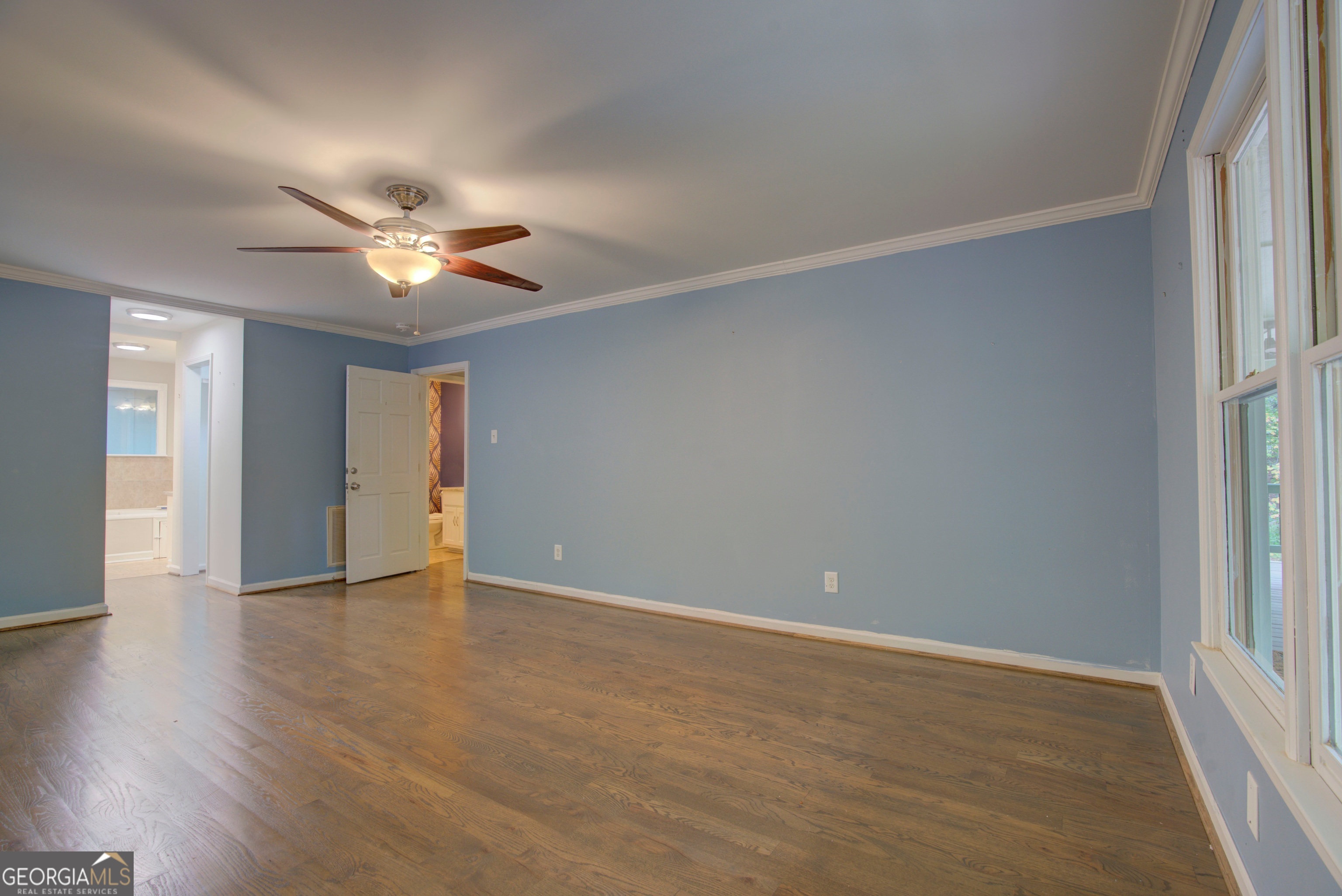 637 Wayside Road Rome, GA 30161 - Photo 14 of 40 a view of an empty room with a window and wooden floor