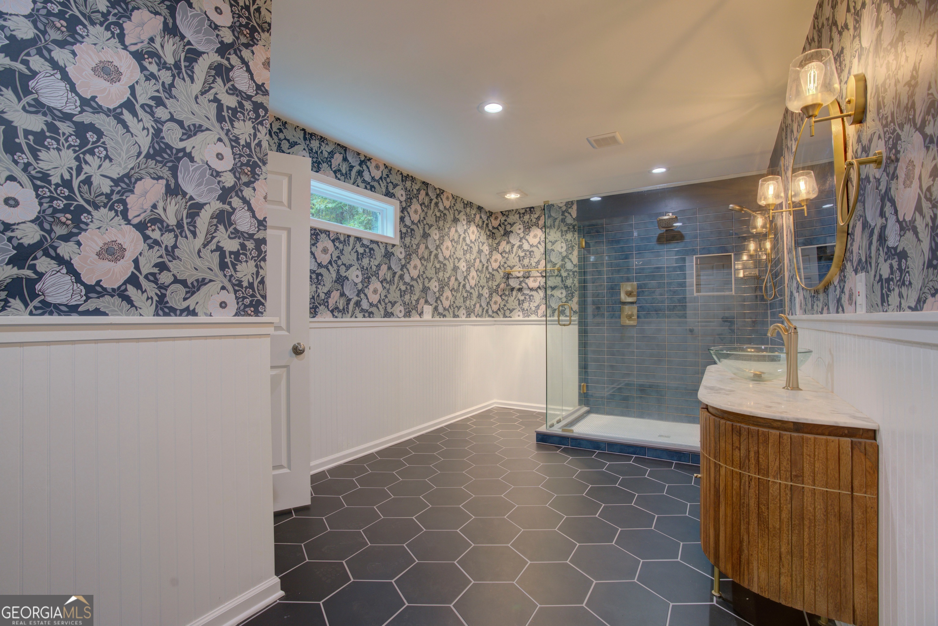 637 Wayside Road Rome, GA 30161 - Photo 21 of 40 a bathroom with a sink and a mirror