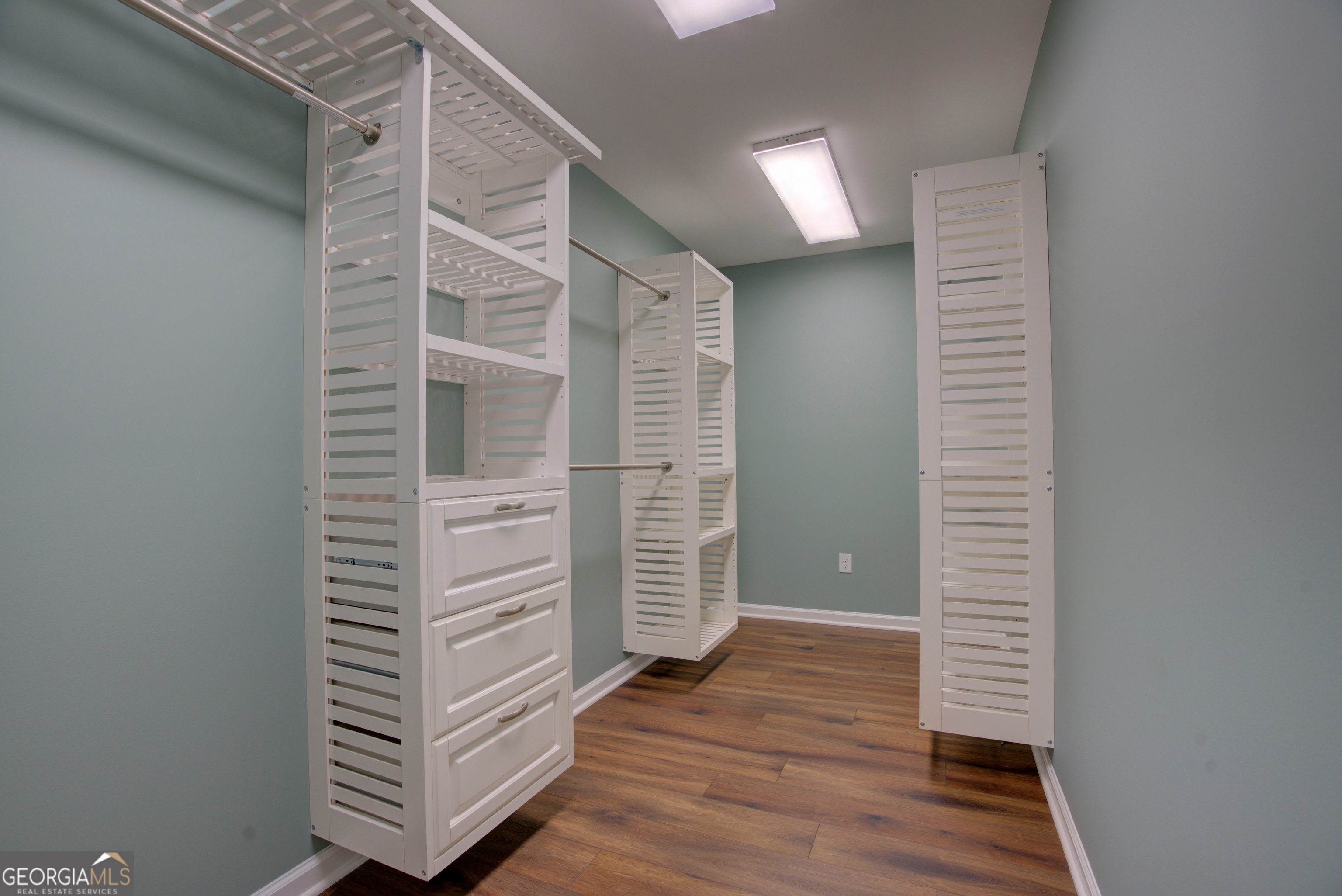 637 Wayside Road Rome, GA 30161 - Photo 23 of 40 a view of walk in closet with clothes