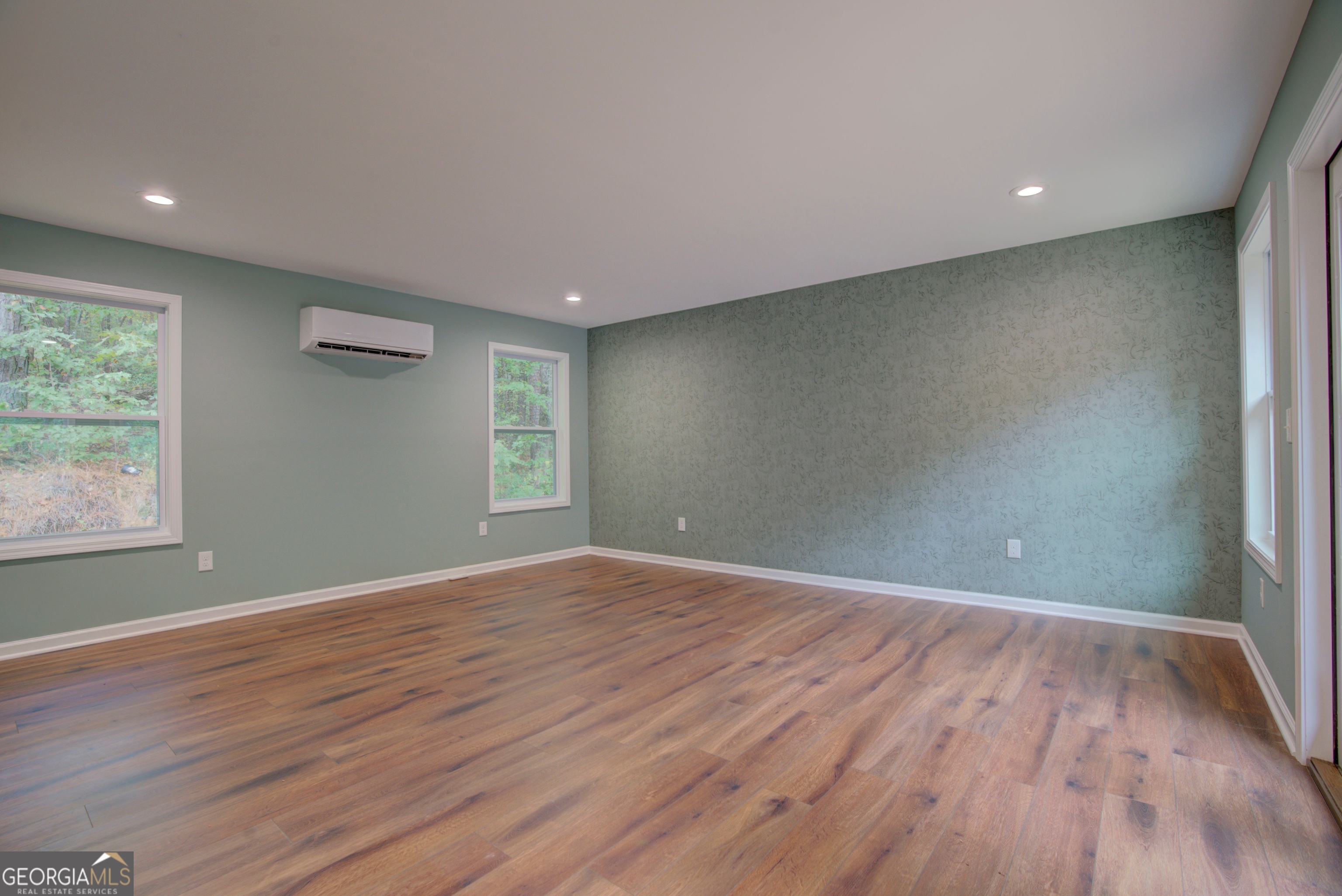 637 Wayside Road Rome, GA 30161 - Photo 24 of 40 a view of an empty room with wooden floor and a window