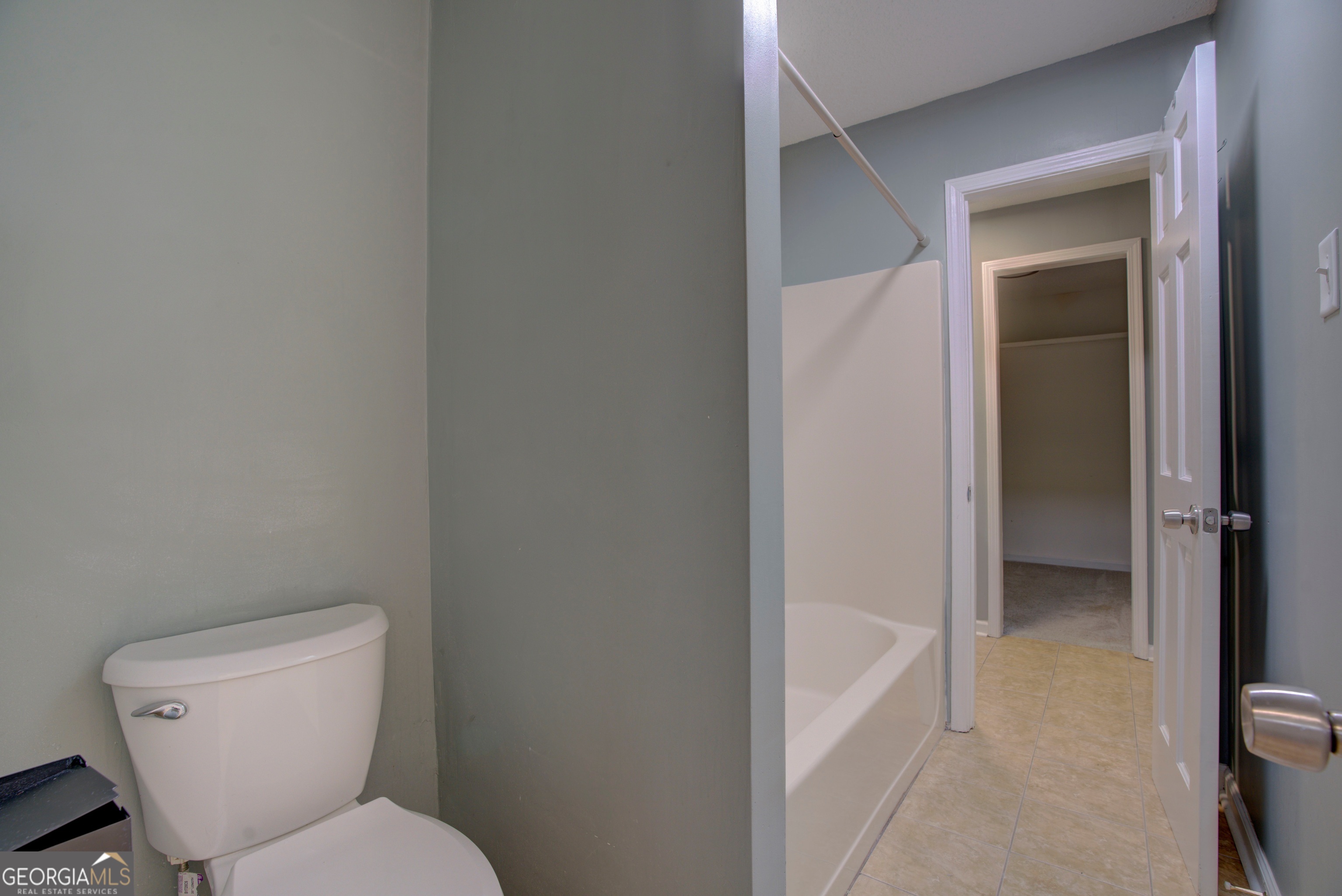 637 Wayside Road Rome, GA 30161 - Photo 29 of 40 a white toilet sitting next to a bathroom sink