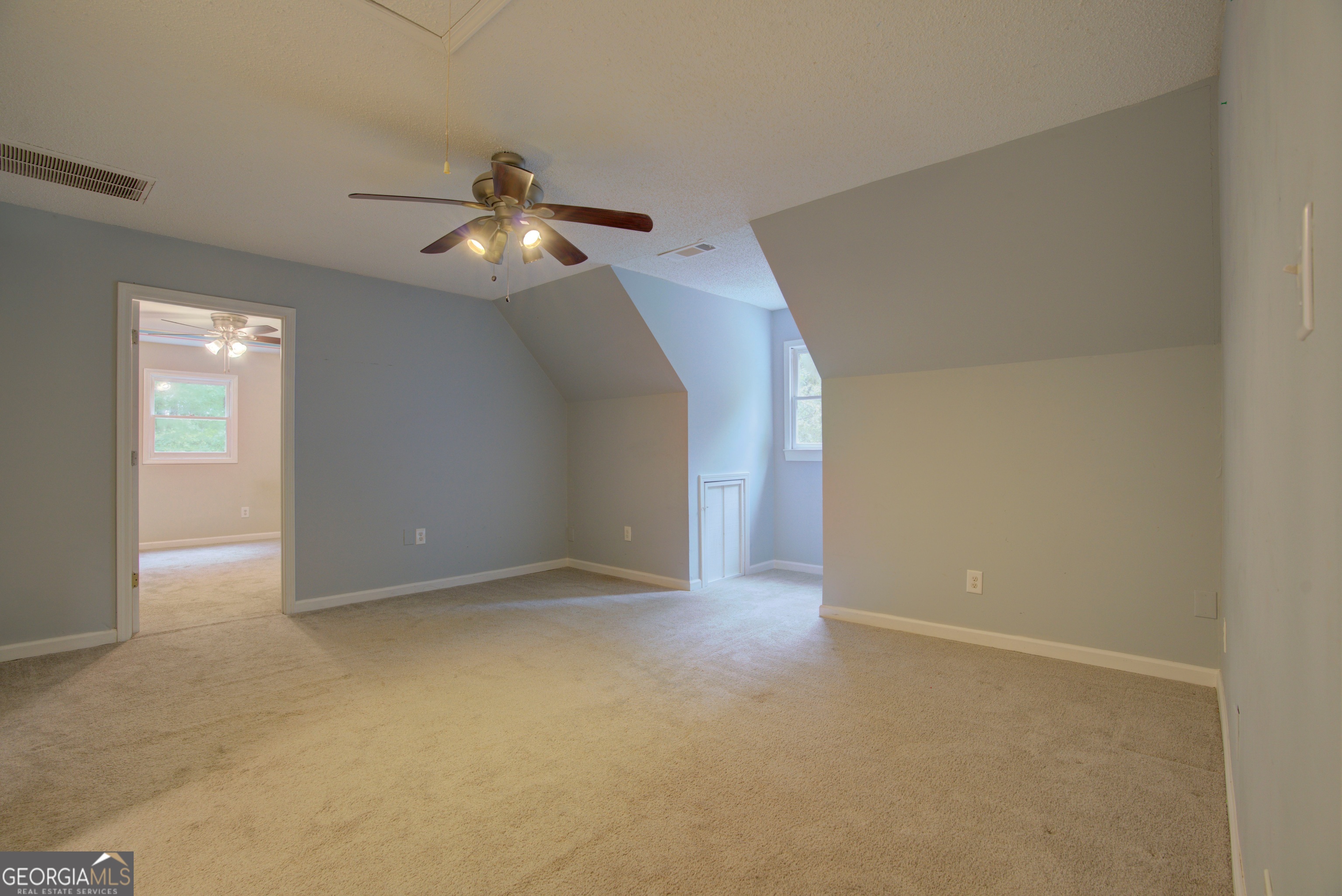 637 Wayside Road Rome, GA 30161 - Photo 31 of 40 a view of an empty room and chandelier fan