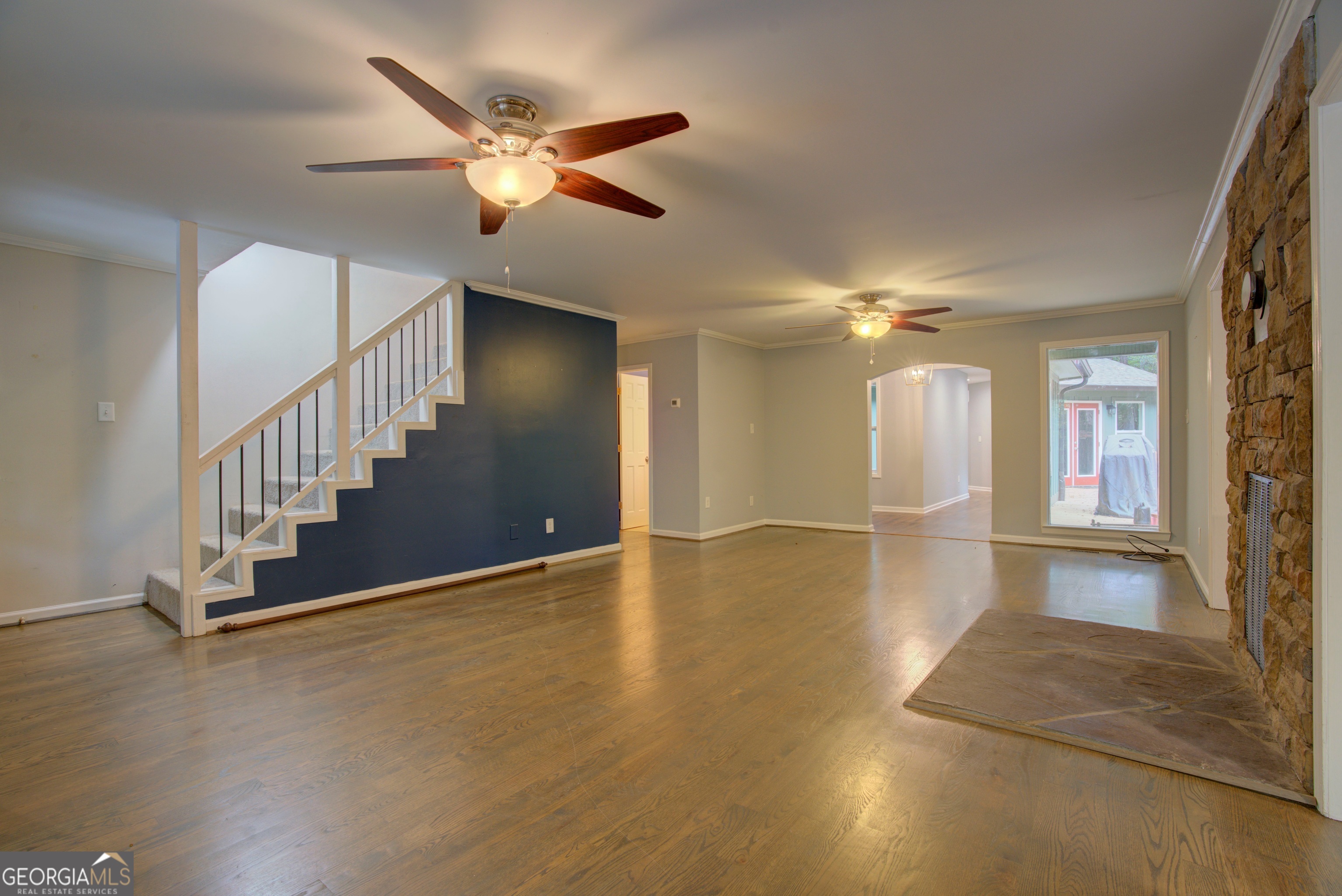 637 Wayside Road Rome, GA 30161 - Photo 6 of 40 a view of a livingroom with a ceiling fan and window