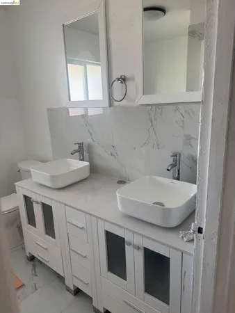 a bathroom with a sink and a vanity