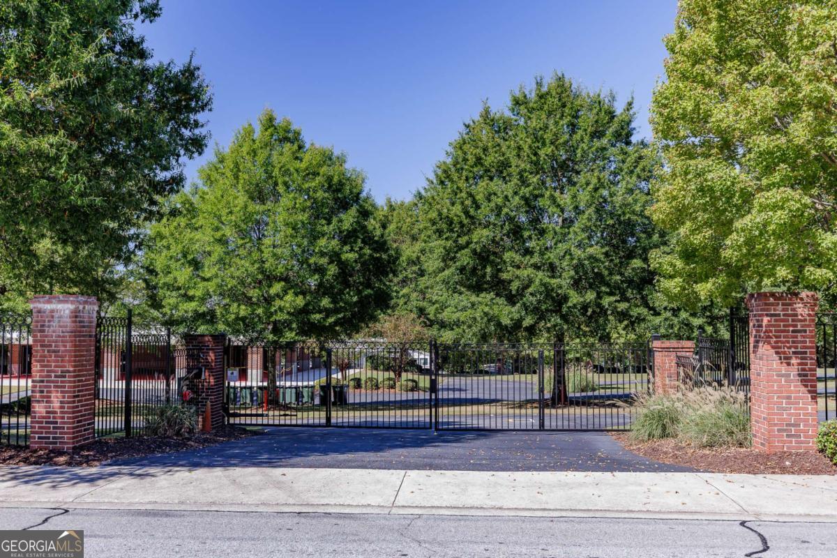 225 Oak Street, Unit 108 Athens, GA 30601 - Photo 12 of 17 an outdoor space with wooden fence