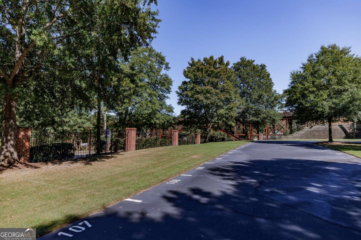 225 Oak Street, Unit 108 Athens, GA 30601 - Photo 9 of 17 a view of backyard with green space