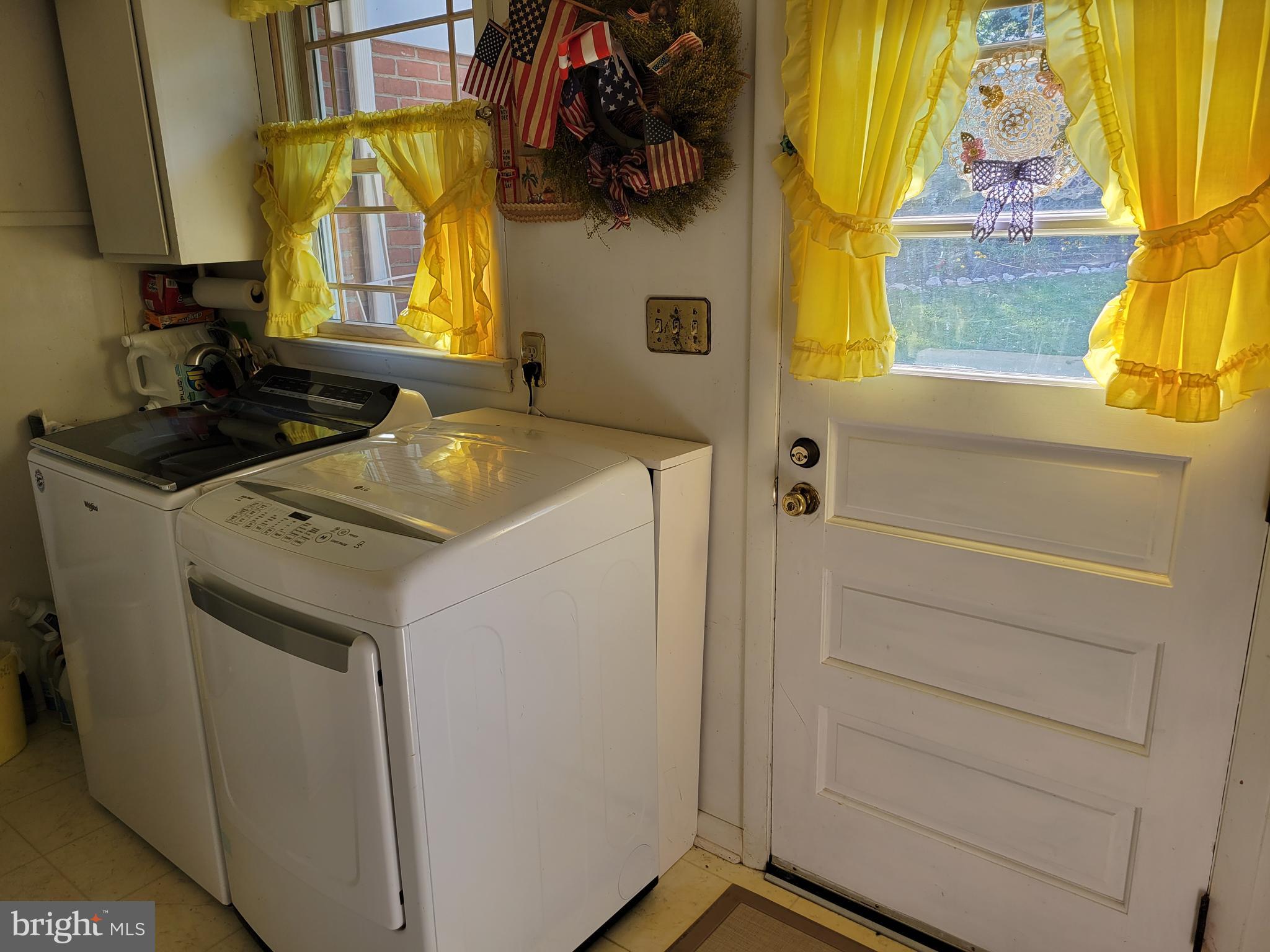 7430 Round Hill Road Frederick, MD 21702 - Photo 31 of 50 Huge new washer & dryer LR with outside access
