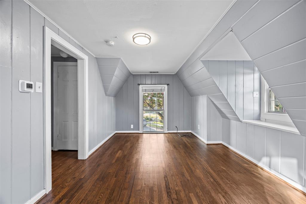 2626 Madera Street Dallas, TX 75206 - Photo 19 of 30 a view of empty room with wooden floor and fan
