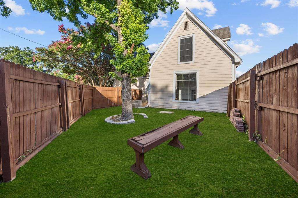 2626 Madera Street Dallas, TX 75206 - Photo 20 of 30 a front view of a house with garden