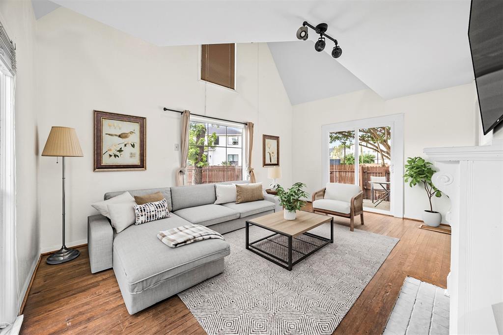 2626 Madera Street Dallas, TX 75206 - Photo 2 of 30 a living room with furniture and a potted plant