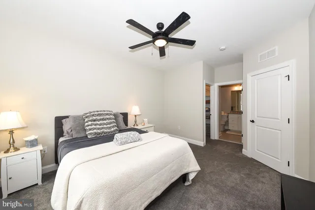 a bedroom with a bed and closet