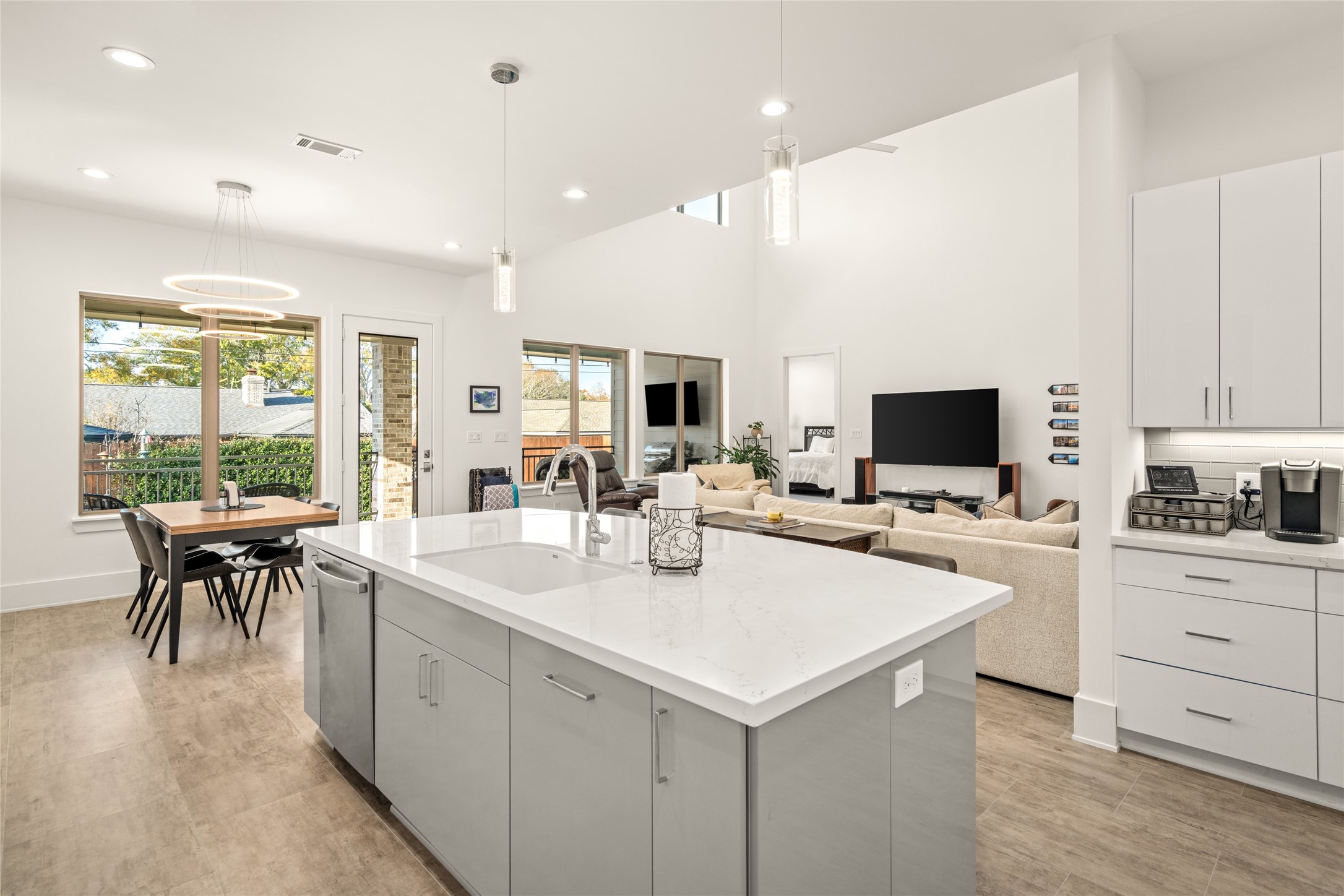 5706 Birdwood Road Houston, TX 77096 - Photo 18 of 50 The Blanco sink and stainless spray faucet make clean up fun. Look at the view! Definitely the heart of the home with everything flowing seamlessly from room to room.