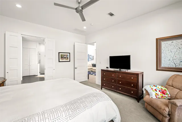 a bathroom with a bathtub sink and mirror